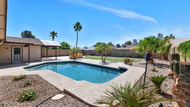 6457 E Encanto St, Mesa, AZ 85205 - view of swimming pool with a patio, a fenced in pool, and a fenced backyard