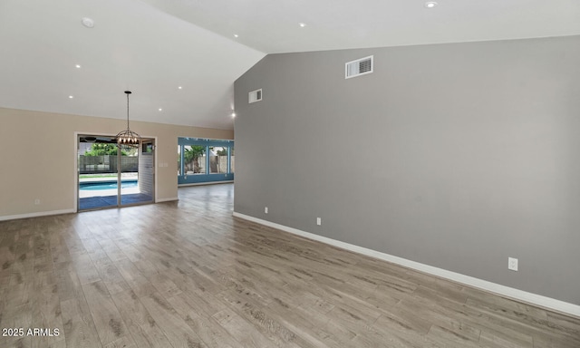 6457 E Encanto St, Mesa, AZ 85205 - spare room featuring baseboards, light wood finished floors, and visible vents
