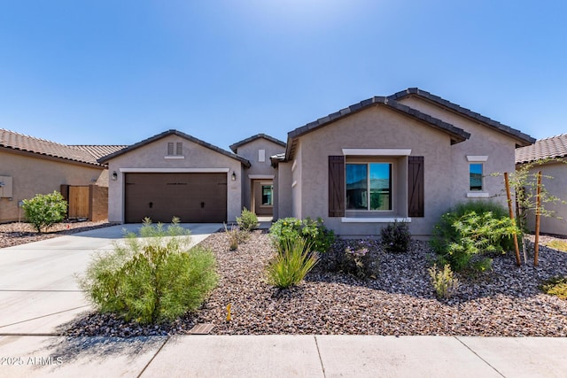 2881 N Riverside Dr, Florence, AZ 85132 - ranch-style home with concrete driveway, an attached garage, stucco siding, and a tile roof