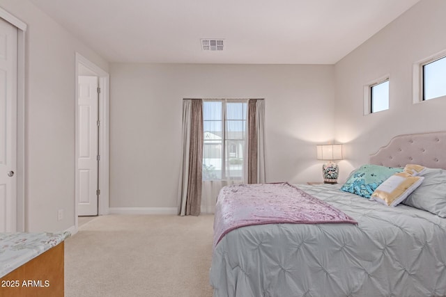 2881 N Riverside Dr, Florence, AZ 85132 - bedroom with light carpet and baseboards