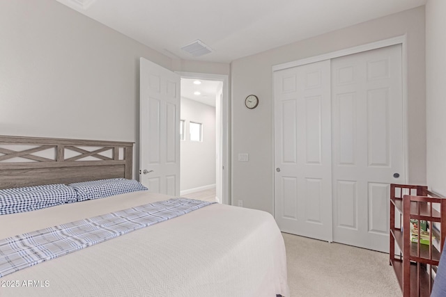 2881 N Riverside Dr, Florence, AZ 85132 - bedroom with light colored carpet, a closet, and recessed lighting