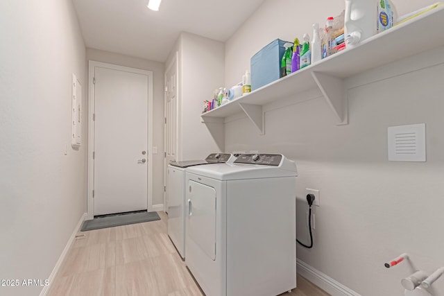 2881 N Riverside Dr, Florence, AZ 85132 - laundry room featuring washer and clothes dryer and baseboards