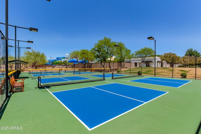 2881 N Riverside Dr, Florence, AZ 85132 - view of tennis court with community basketball court and fence