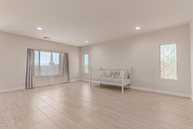 2881 N Riverside Dr, Florence, AZ 85132 - unfurnished room featuring recessed lighting, baseboards, and light tile patterned floors