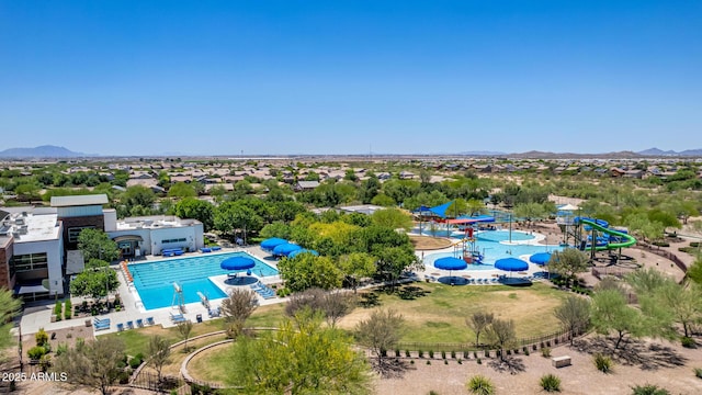 2881 N Riverside Dr, Florence, AZ 85132 - drone / aerial view of a pool area and a mountainous background
