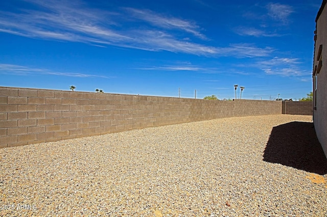 41600 W Dusty Creek Dr, Maricopa, AZ 85138 - view of yard featuring a fenced backyard