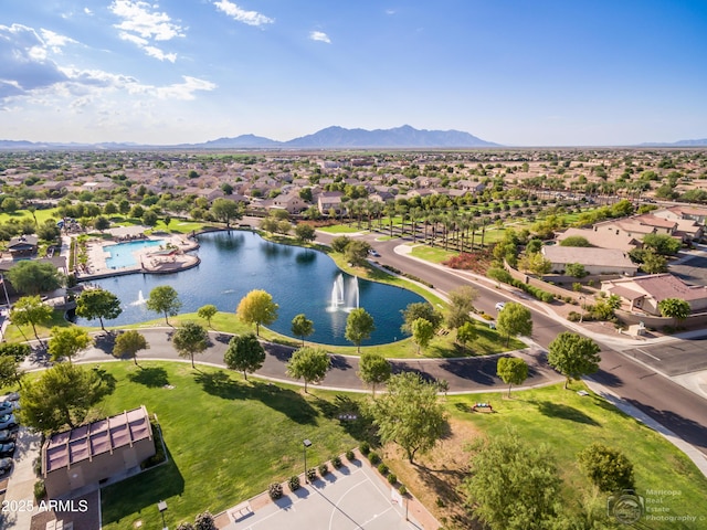 birds eye view of property featuring a residential view and a water and mountain view