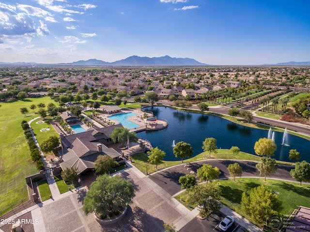 bird's eye view featuring a water and mountain view