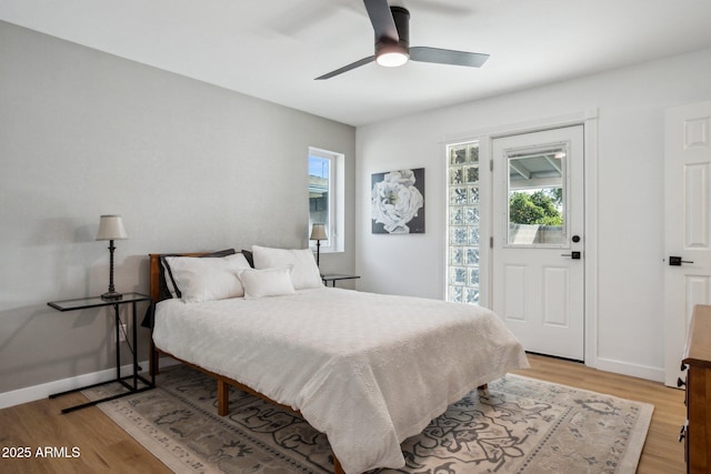 bedroom featuring light hardwood / wood-style flooring and ceiling fan