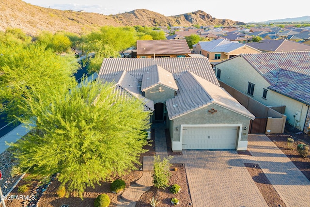 10207 W Hedge Hog Pl, Peoria, AZ 85383 - aerial perspective of suburban area with a mountain backdrop