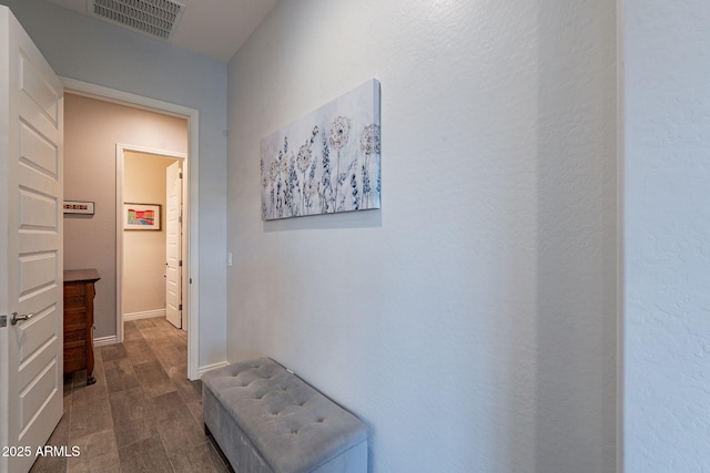10207 W Hedge Hog Pl, Peoria, AZ 85383 - hall with dark wood-type flooring and baseboards