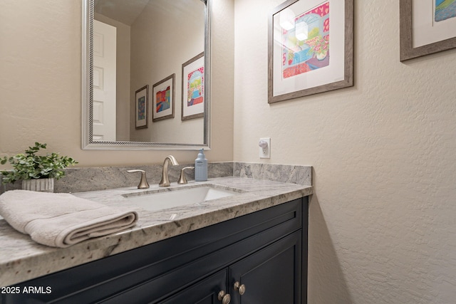 10207 W Hedge Hog Pl, Peoria, AZ 85383 - bathroom featuring a textured wall and vanity