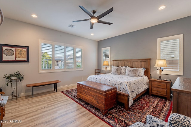 10207 W Hedge Hog Pl, Peoria, AZ 85383 - bedroom with light wood finished floors, recessed lighting, baseboards, and a ceiling fan