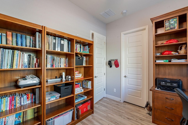 10207 W Hedge Hog Pl, Peoria, AZ 85383 - home office with light wood-style flooring