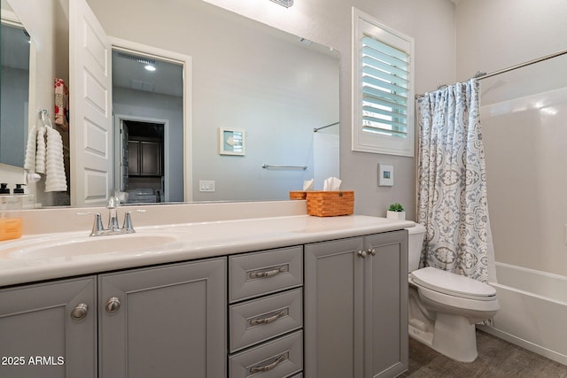 10207 W Hedge Hog Pl, Peoria, AZ 85383 - full bathroom featuring vanity, toilet, shower / bath combination with curtain, and wood finished floors