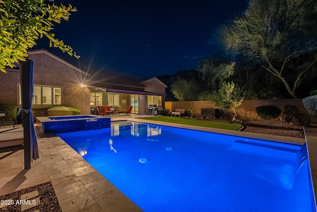 10207 W Hedge Hog Pl, Peoria, AZ 85383 - pool at twilight featuring a patio area, area for grilling, and a pool with connected hot tub