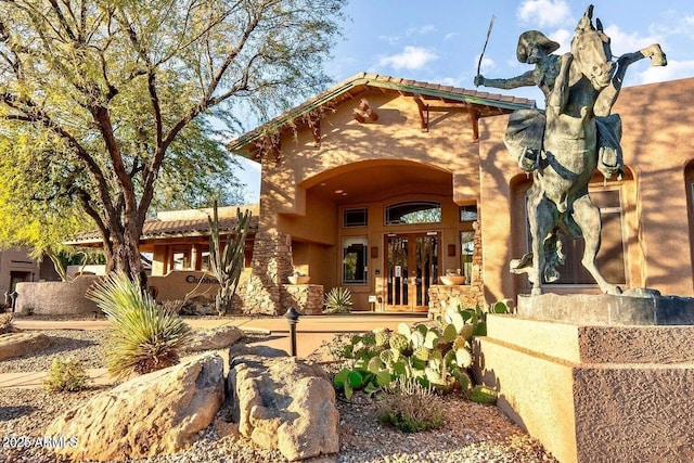 view of exterior entry with french doors