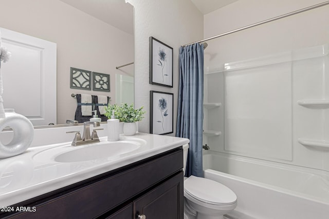 full bathroom featuring toilet, vanity, and shower / bathtub combination with curtain