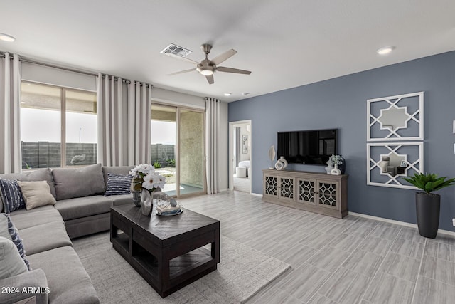 living room featuring ceiling fan