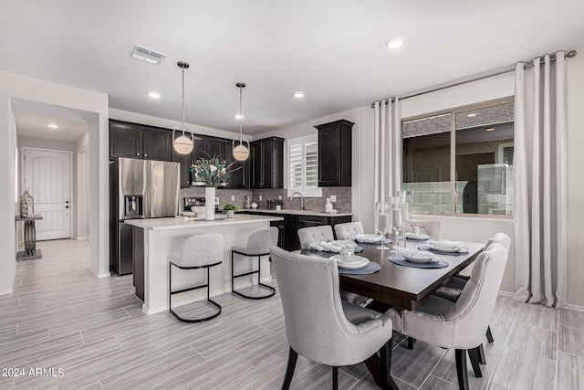 dining space with sink