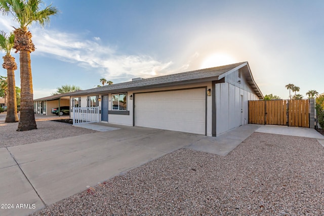 single story home featuring a garage