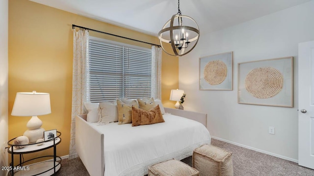 24052 W Pima St, Buckeye, AZ 85326 - carpeted bedroom with a chandelier and baseboards