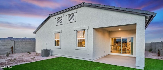 24052 W Pima St, Buckeye, AZ 85326 - rear view of house featuring a fenced backyard, stucco siding, and a patio