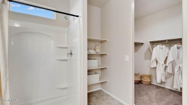 24052 W Pima St, Buckeye, AZ 85326 - full bathroom featuring a shower and a spacious closet