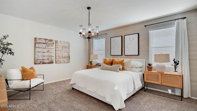 24052 W Pima St, Buckeye, AZ 85326 - carpeted bedroom featuring a chandelier and baseboards