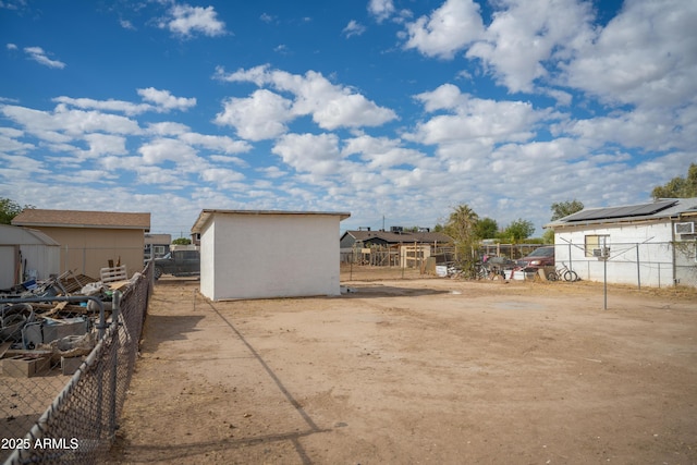 view of yard with a storage unit