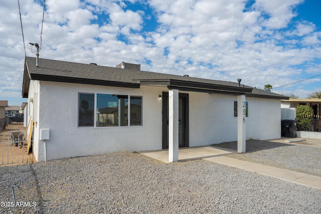 rear view of property with a patio