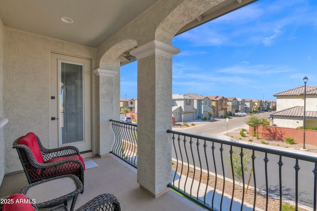 balcony featuring a residential view