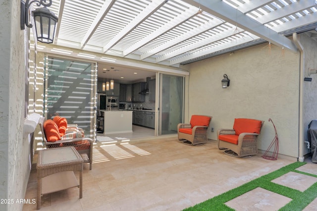 view of patio / terrace featuring a pergola