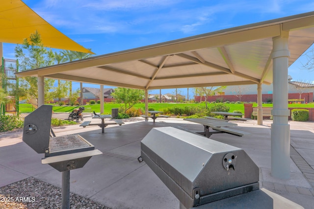 view of patio / terrace featuring a gazebo and fence