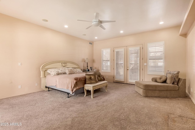 carpeted bedroom with french doors, ceiling fan, and access to outside