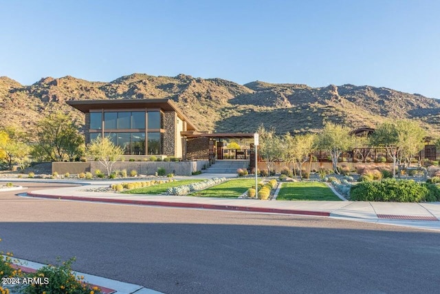 view of front of home with a mountain view