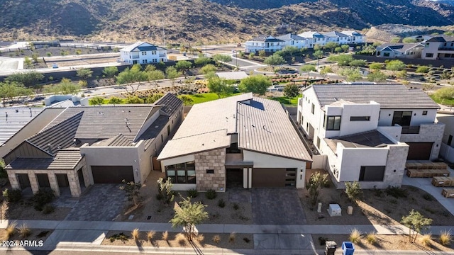 drone / aerial view featuring a mountain view