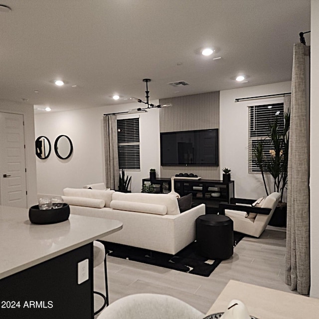 living room with light hardwood / wood-style floors