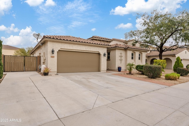 mediterranean / spanish home featuring a garage