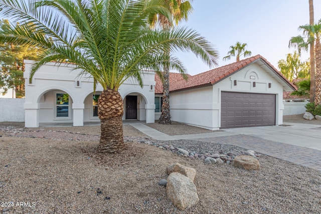 view of front of property with a garage