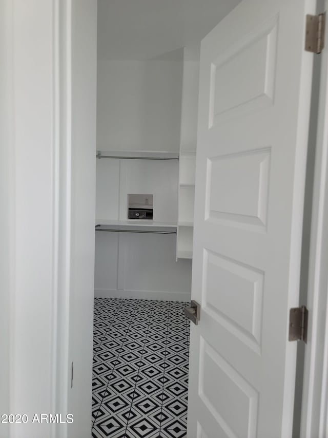 bathroom featuring tile floors