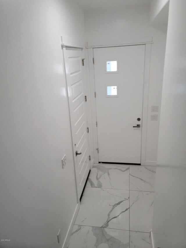 foyer with light tile flooring