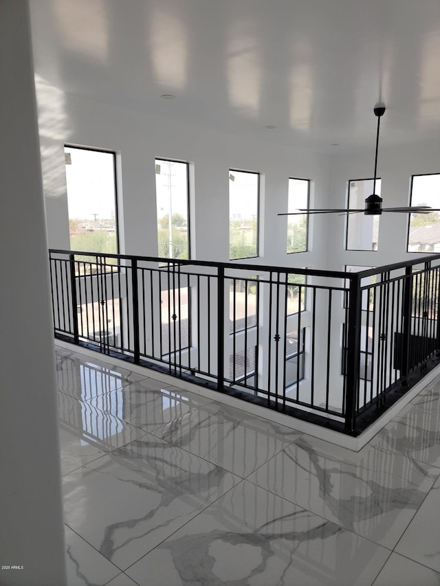 hallway featuring light tile floors