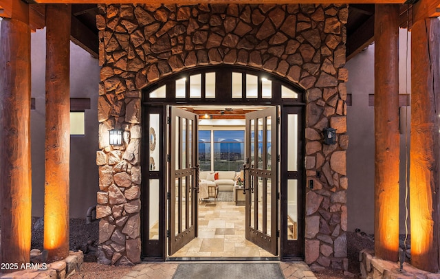 entrance to property featuring french doors