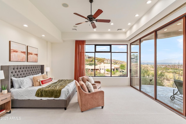 carpeted bedroom featuring access to exterior, recessed lighting, visible vents, and a ceiling fan