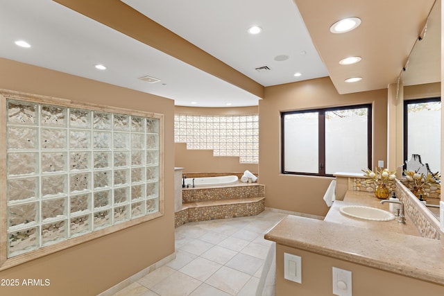 bathroom with visible vents, recessed lighting, a bath, and tile patterned floors