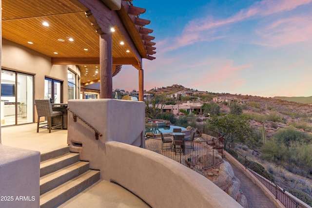 view of patio featuring french doors and outdoor dining area