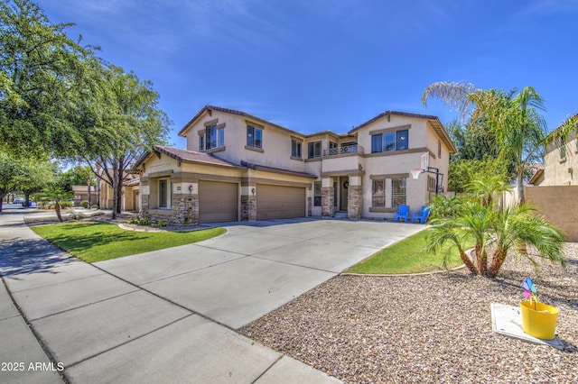 4609 E Ironhorse Rd, Gilbert, AZ 85297 - view of front of house featuring a garage, stucco siding, stone siding, and concrete driveway