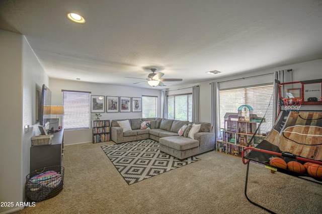 4609 E Ironhorse Rd, Gilbert, AZ 85297 - living area with carpet floors and ceiling fan