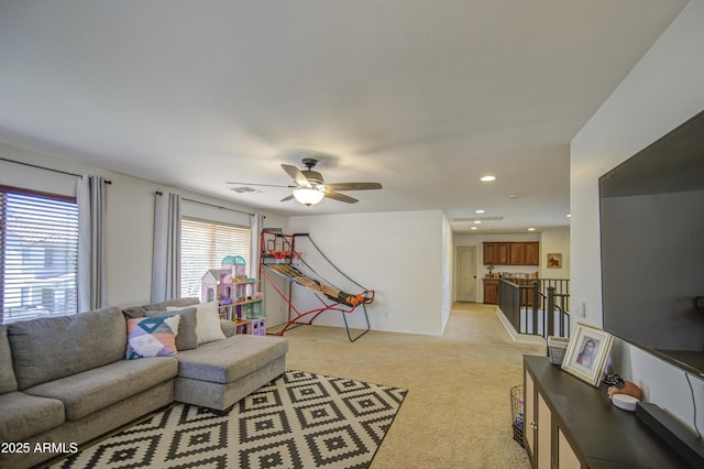 4609 E Ironhorse Rd, Gilbert, AZ 85297 - living room with light colored carpet, a ceiling fan, and recessed lighting